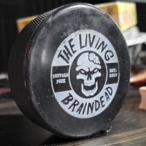 Living Braindead "Established" Logo Hockey Puck